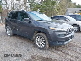 2016 Jeep Cherokee Limited with VIN 1C4PJMDB8GW309110, listed as a IAAI auction lot 41990343 with 163,054 mi miles. Bid and sale history available at carsss.com. Image 1.