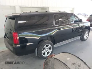 2015 Chevrolet Suburban LT with VIN 1GNSKJKC7FR199544, listed as a IAAI auction lot 42169017 with 219,219 mi miles and . Bid and sale history available at DreamBid. Image 4.