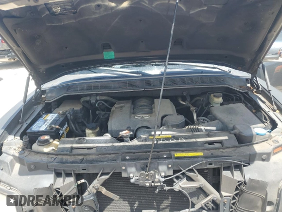 2006 Infiniti QX56 z VIN 5N3AA08A26N807620, wystawiony jako Copart lot #66207424 z przebiegiem 186 381 mil mil oraz Czysty tytuł • Clean title. Historia ofert i sprzedaży dostępna na DreamBid. Obrazek 12.