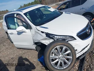 2020 Buick Envision Essence with VIN LRBFXCSA7LD014163, listed as a IAAI auction lot 41102656 with 23,277 mi miles and . Bid and sale history available at carsss.com. Image 1.