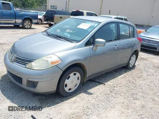 2008 Nissan Versa S with VIN 3N1BC13E28L402729, listed as a IAAI auction lot 42410907 with 319,129 mi miles and . Bid and sale history available at DreamBid. Image 2.