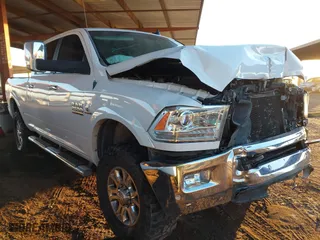 2018 Ram 2500 Laramie with VIN 3C6UR5FL0JG115269, listed as a IAAI auction lot 41310111 with 134,756 mi miles. Bid and sale history available at carsss.com. Image 1.