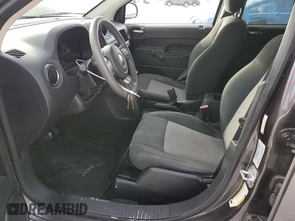 2016 Jeep Compass Sport SE with VIN 1C4NJDBBXGD523537, listed as a Copart auction lot 87664995 with 132,010 mi miles and Salvage title. Bid and sale history available at DreamBid. Image 7.