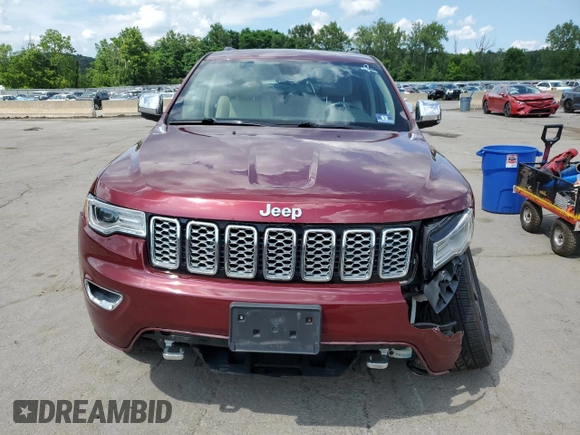 2017 Jeep Grand Cherokee Overland with VIN 1C4RJFCG5HC874130, listed as a Copart auction lot 65324695 with 101,588 mi miles and Salvage title. Bid and sale history available at DreamBid. Image 5.