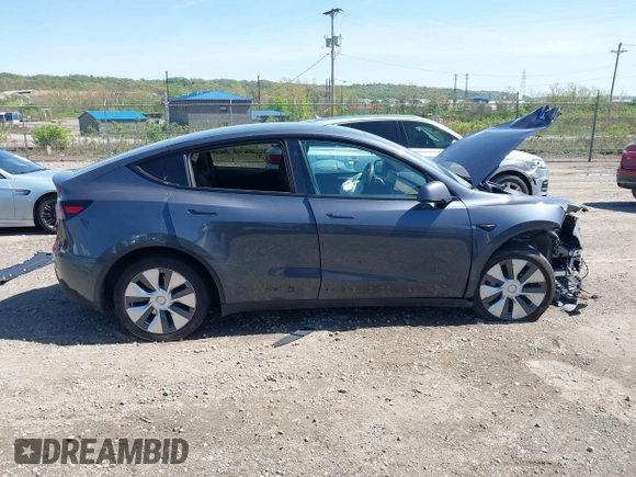 2023 Tesla Model Y Long Range z VIN 7SAYGDEE8PA191415, wystawiony jako IAAI lot #42155577 z przebiegiem 42 149 mil mil oraz . Historia ofert i sprzedaży dostępna na DreamBid. Obrazek 14.