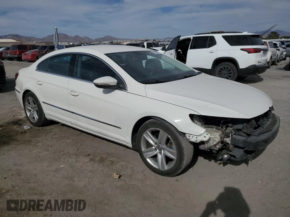2013 Volkswagen CC Sport with VIN WVWBP7AN9DE567212, listed as a Copart auction lot 52998835 with 127,255 mi miles and Salvage Title. Bid and sale history available at carsss.com. Image 4.