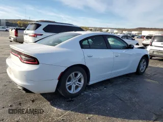 2020 Dodge Charger SXT with VIN 2C3CDXBG2LH237226, listed as a Copart auction lot 79824874 with 96,390 mi miles and Salvage Title. Bid and sale history available at carsss.com. Image 3.