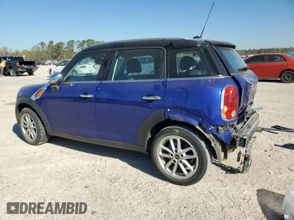 2015 MINI Countryman with VIN WMWZB3C53FWR44727, listed as a Copart auction lot 49456945 with 89,381 mi miles and Salvage Title. Bid and sale history available at DreamBid. Image 2.