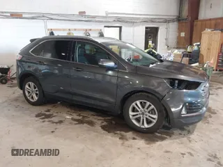 2020 Ford Edge SEL z VIN 2FMPK4J99LBA44087, wystawiony jako IAAI lot #41412691 z przebiegiem 123 897 mil mil oraz . Historia ofert i sprzedaży dostępna na DreamBid. Obrazek 1.