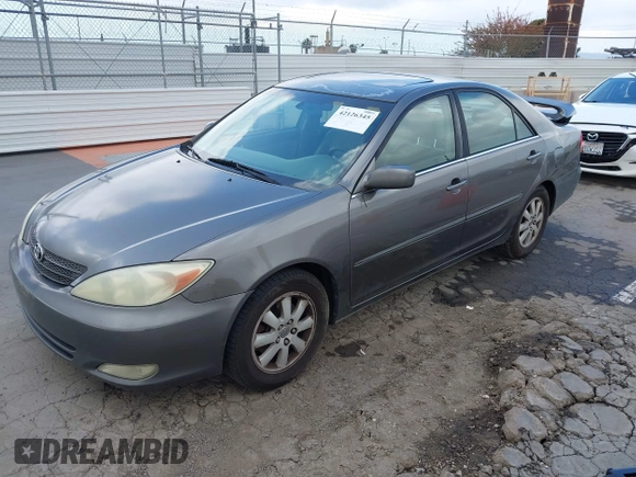 2004 Toyota Camry LE with VIN 4T1BF32K84U588764, listed as a IAAI auction lot 42126345 with 144,642 mi miles. Bid and sale history available at carsss.com. Image 18.
