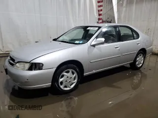 1999 Nissan Altima XE with VIN 1N4DL01D4XC254450, listed as a Copart auction lot 43010665 with 124,722 mi miles and Salvage Title. Bid and sale history available at carsss.com. Image 1.