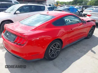 2020 Ford Mustang EcoBoost with VIN 1FA6P8THXL5111643, listed as a IAAI auction lot 42223704 with 59,170 mi miles and . Bid and sale history available at DreamBid. Image 4.