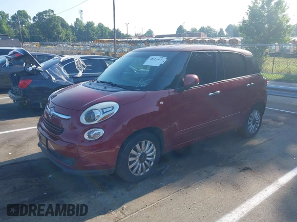 2014 FIAT 500L Easy with VIN ZFBCFABH9EZ020600, listed as a IAAI auction lot 42626910 with 84,552 mi miles and . Bid and sale history available at DreamBid. Image 2.