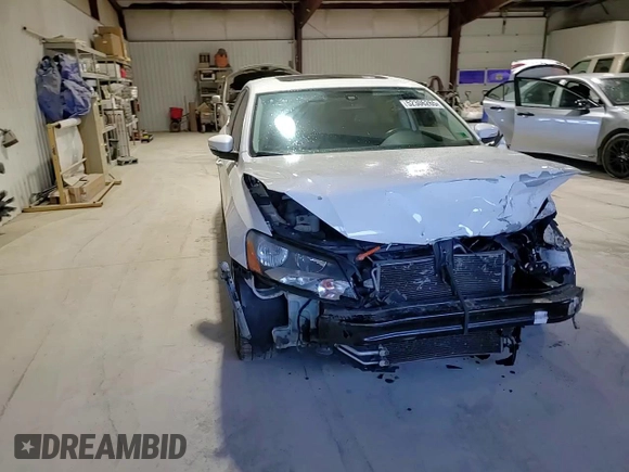2013 Volkswagen Passat SE w/Sunroof with VIN 1VWBP7A34DC056451, listed as a Copart auction lot 52306265 with 143,112 mi miles and Salvage Title. Bid and sale history available at carsss.com. Image 10.