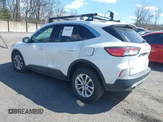 2020 Ford Escape SE with VIN 1FMCU9G61LUB80243, listed as a IAAI auction lot 41842611 with 76,801 mi miles. Bid and sale history available at carsss.com. Image 3.