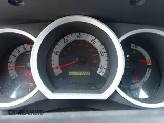 2013 Toyota Tacoma with VIN 3TMMU4FNXDM057020, listed as a IAAI auction lot 42560987 with 177,333 mi miles and . Bid and sale history available at DreamBid. Image 7.