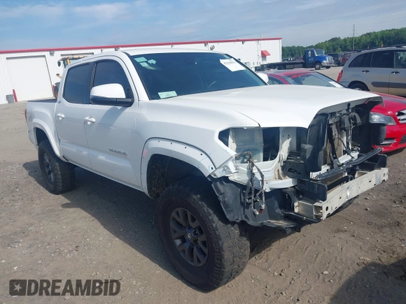 2023 Toyota Tacoma SR with VIN 3TYCZ5AN2PT112854, listed as a IAAI auction lot 42220025 with 43,657 mi miles and . Bid and sale history available at DreamBid. Image 1.