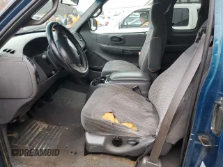 2000 Ford F-150 XL with VIN 1FTRX17W5YNA58235, listed as a Copart auction lot 84026504 with 0 mi miles and Salvage Title. Bid and sale history available at carsss.com. Image 7.