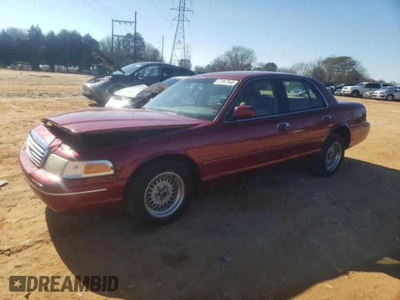 1998 Ford Crown Victoria LX с VIN 2FAFP74W3WX138757, выставлен на аукционе Copart как лот 87867945 с пробегом 148 827 миль миль и Списание • Salvage title. История ставок и продаж доступна на DreamBid. Изображение 1.