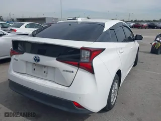 2019 Toyota Prius L Eco with VIN JTDKARFU2K3075613, listed as a IAAI auction lot 41691401 with 83,053 mi miles. Bid and sale history available at carsss.com. Image 4.