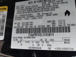 2020 Ford Mustang EcoBoost with VIN 1FA6P8TH3L5105814, listed as a IAAI auction lot 41778304 with 63,771 mi miles. Bid and sale history available at carsss.com. Image 9.