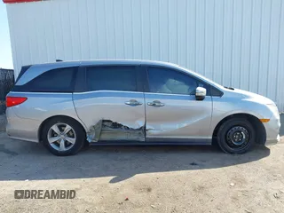 2019 Honda Odyssey EX-L with VIN 5FNRL6H79KB043145, listed as a IAAI auction lot 41569198 with 94,560 mi miles. Bid and sale history available at carsss.com. Image 13.