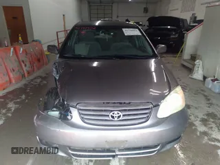 2004 Toyota Corolla CE with VIN 1NXBR32E14Z204650, listed as a IAAI auction lot 41710452 with 168,099 mi miles. Bid and sale history available at carsss.com. Image 12.