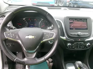 2020 Chevrolet Equinox LT with VIN 2GNAXJEV7L6231166, listed as a IAAI auction lot 42572055 with 24,491 mi miles and . Bid and sale history available at DreamBid. Image 13.