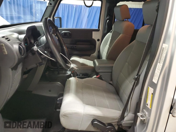 2008 Jeep Wrangler Unlimited Rubicon с VIN 1J4GA69128L590958, выставлен на аукционе Copart как лот 54013755 с пробегом 146 997 миль миль и Чистый • Clean title. История ставок и продаж доступна на DreamBid. Изображение 7.