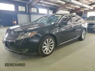 2015 Lincoln MKS с VIN 1LNHL9DK7FG601900, выставлен на аукционе Copart как лот 67015885 с пробегом 219 040 миль миль и Чистый • Clean title. История ставок и продаж доступна на DreamBid. Изображение 1.