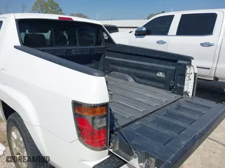 2007 Honda Ridgeline RTL w/Leather with VIN 2HJYK16547H529037, listed as a IAAI auction lot 41763786 with 195,240 mi miles. Bid and sale history available at carsss.com. Image 14.