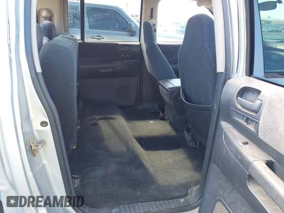 2003 Dodge Dakota SLT with VIN 1D7HL48N33S295059, listed as a IAAI auction lot 42085612 with 176,934 mi miles. Bid and sale history available at carsss.com. Image 8.