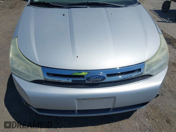 2008 Ford Focus SE with VIN 1FAHP35N88W271973, listed as a IAAI auction lot 42090204 with 261,457 mi miles. Bid and sale history available at carsss.com. Image 6.