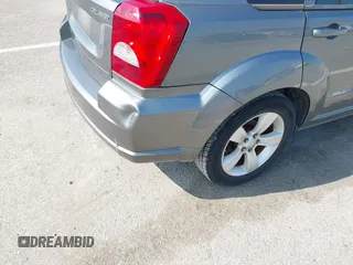 2012 Dodge Caliber SXT with VIN 1C3CDWDA3CD507614, listed as a IAAI auction lot 42107559 with 109,236 mi miles. Bid and sale history available at carsss.com. Image 6.