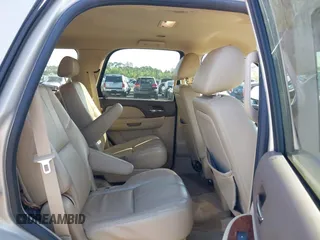 2010 GMC Yukon SLT with VIN 1GKMCCE3XAR225380, listed as a IAAI auction lot 41904723 with 173,686 mi miles. Bid and sale history available at carsss.com. Image 8.