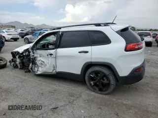 2017 Jeep Cherokee Altitude with VIN 1C4PJLAB2HW573567, listed as a Copart auction lot 59630205 with 105,975 mi miles and Salvage title. Bid and sale history available at DreamBid. Image 2.