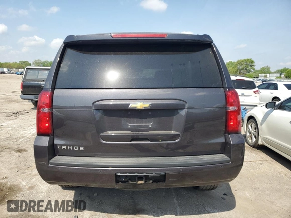 2016 Chevrolet Tahoe LT with VIN 1GNSKBKC8GR438834, listed as a Copart auction lot 57151045 with 129,234 mi miles and Salvage title. Bid and sale history available at DreamBid. Image 6.