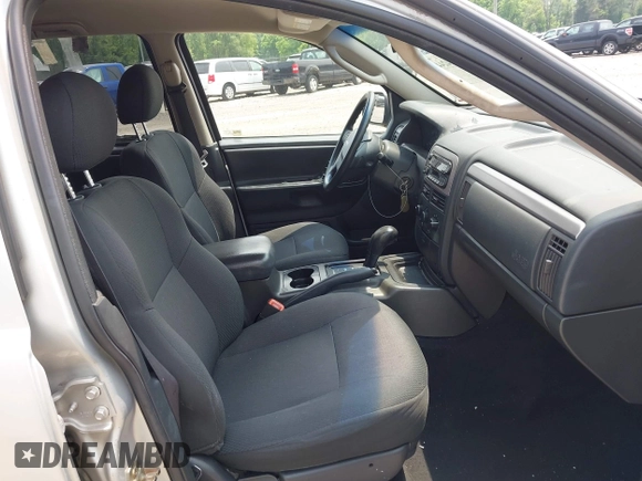 2002 Jeep Grand Cherokee Laredo with VIN 1J4GW48SX2C313093, listed as a IAAI auction lot 42446559 with 200,319 mi miles and . Bid and sale history available at DreamBid. Image 5.