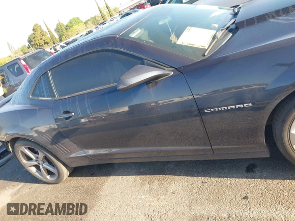 2014 Chevrolet Camaro LT z VIN 2G1FB1E35E9126793, wystawiony jako IAAI lot #41959896 z przebiegiem Nie podano mil oraz . Historia ofert i sprzedaży dostępna na DreamBid. Obrazek 14.