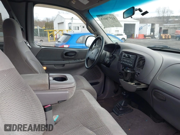 2000 Ford F-150 XL with VIN 1FTRX18WXYNC25817, listed as a IAAI auction lot 41976618 with 148,794 mi miles and . Bid and sale history available at DreamBid. Image 5.