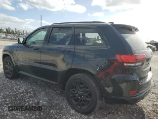 2021 Jeep Grand Cherokee 80th Anniversary z VIN 1C4RJEBG1MC844595, wystawiony jako Copart lot #54899195 z przebiegiem 19 287 mil mil oraz Szkoda całkowita • Salvage title. Historia ofert i sprzedaży dostępna na DreamBid. Obrazek 2.