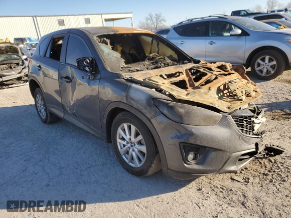 2015 Mazda CX-5 Touring with VIN JM3KE4CY4F0432335, listed as a Copart auction lot 83258294 with 0 mi miles and Non Repairable. Bid and sale history available at carsss.com. Image 4.