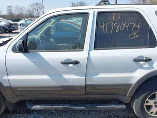 2004 Ford Escape XLT with VIN 1FMYU93164KA96674, listed as a IAAI auction lot 41780474 with 182,525 mi miles. Bid and sale history available at carsss.com. Image 14.