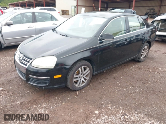 2005 Volkswagen Jetta 2.5L with VIN 3VWDF71K65M641809, listed as a IAAI auction lot 42230703 with 215,996 mi miles and . Bid and sale history available at DreamBid. Image 2.