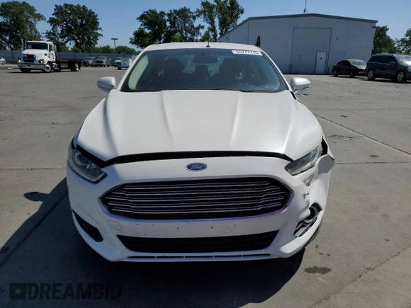 2013 Ford Fusion SE Hybrid z VIN 3FA6P0LU6DR325719, wystawiony jako Copart lot #55777715 z przebiegiem 152 478 mil mil oraz Szkoda całkowita • Salvage title. Historia ofert i sprzedaży dostępna na DreamBid. Obrazek 5.