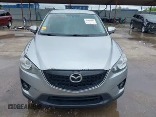 2014 Mazda CX-5 Touring z VIN JM3KE2CY8E0369145, wystawiony jako IAAI lot #42462985 z przebiegiem 155 480 mil mil oraz . Historia ofert i sprzedaży dostępna na DreamBid. Obrazek 12.