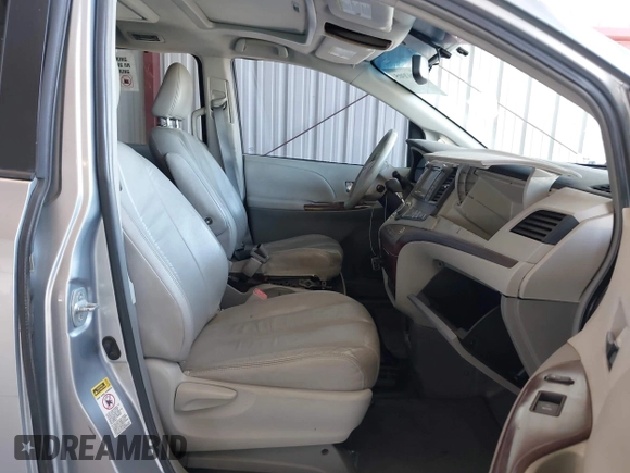 2011 Toyota Sienna XLE AAS with VIN 5TDYK3DC0BS107522, listed as a IAAI auction lot 42207305 with 171,857 mi miles and . Bid and sale history available at DreamBid. Image 5.