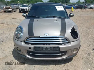 2012 MINI Hardtop z VIN WMWSU3C55CT369622, wystawiony jako IAAI lot #42458180 z przebiegiem 141 444 mil mil oraz . Historia ofert i sprzedaży dostępna na DreamBid. Obrazek 12.