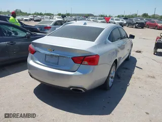 2014 Chevrolet Impala LTZ with VIN 1G1155S31EU158639, listed as a IAAI auction lot 41971523 with 222,414 mi miles. Bid and sale history available at carsss.com. Image 4.