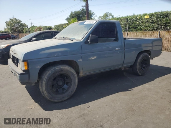1990 Nissan Frontier with VIN 1N6SD11S9LC321876, listed as a Copart auction lot 59913575 with 119,909 mi miles and Salvage title. Bid and sale history available at DreamBid. Image 1.
